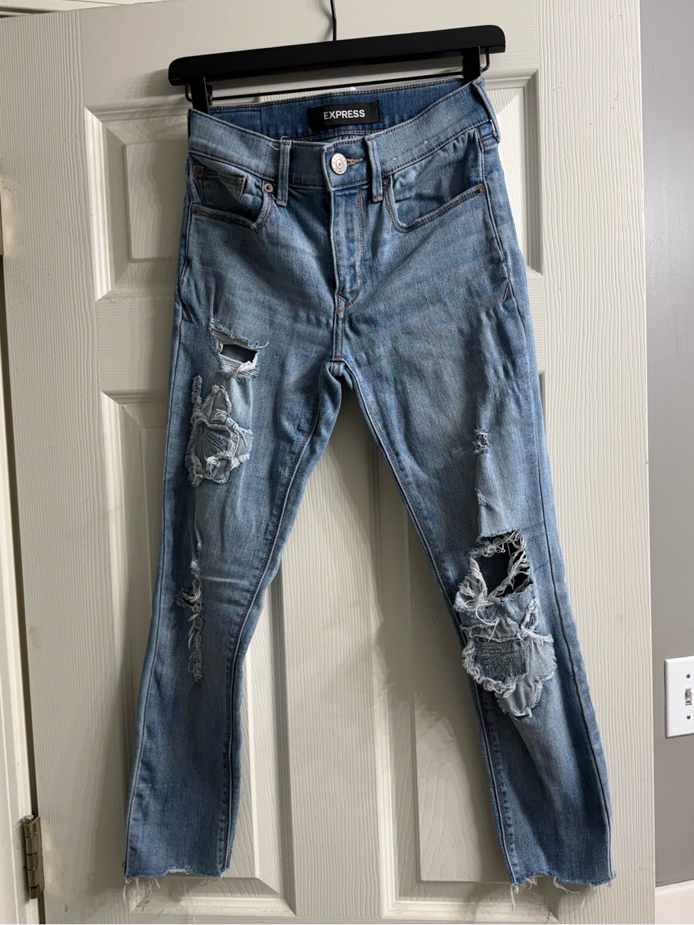 Express Distressed Light Blue Skinny Jeans with floral accents